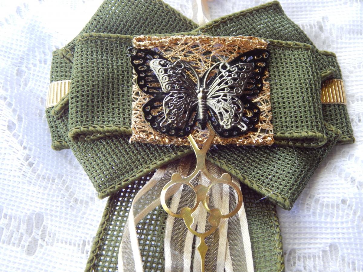 Butterfly on Green and Gold Ribbon picture