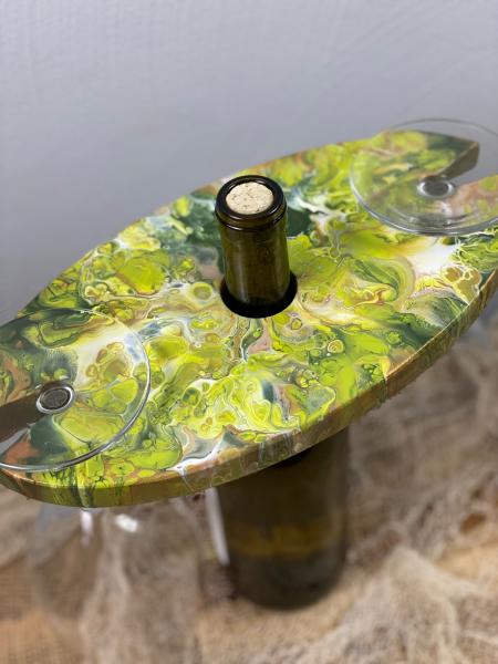 Wine bottle and glass holder picture