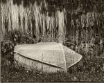 Boat at the old Fishin' Hole, Black & White Print with a black mat.