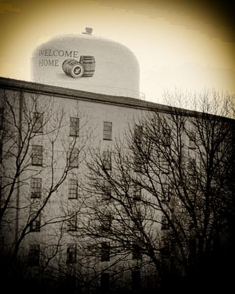 Welcome Home, Wild Turkey Distillery Water Tower a black mat. picture