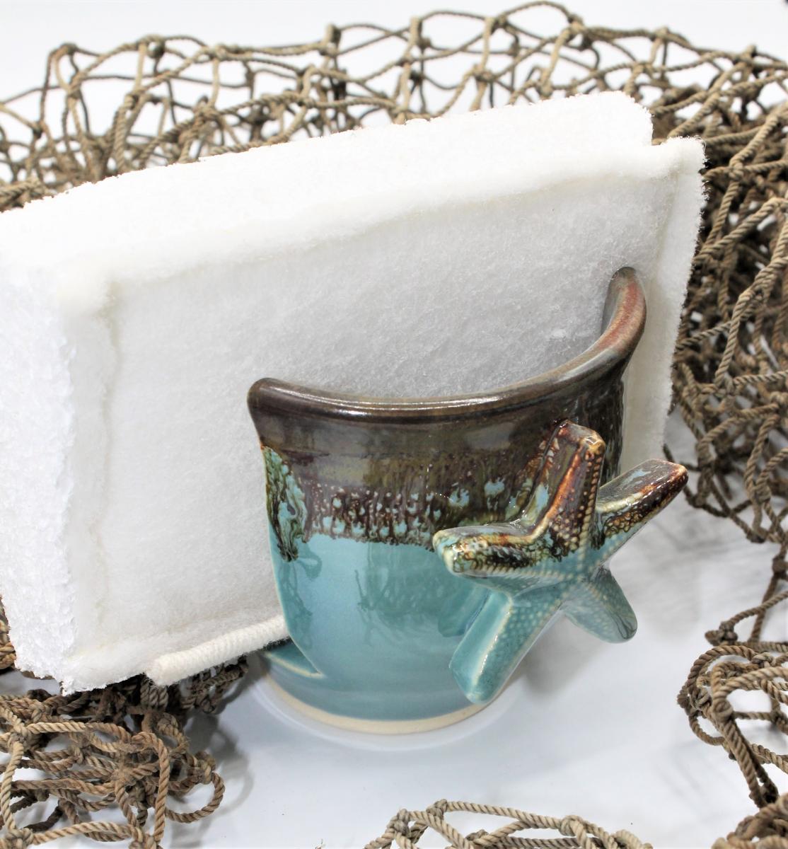 Sponge holder with star fish picture