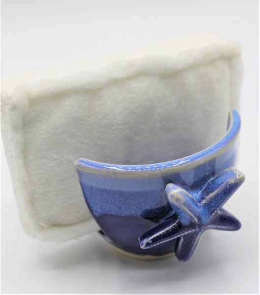 Sponge holder with star fish picture