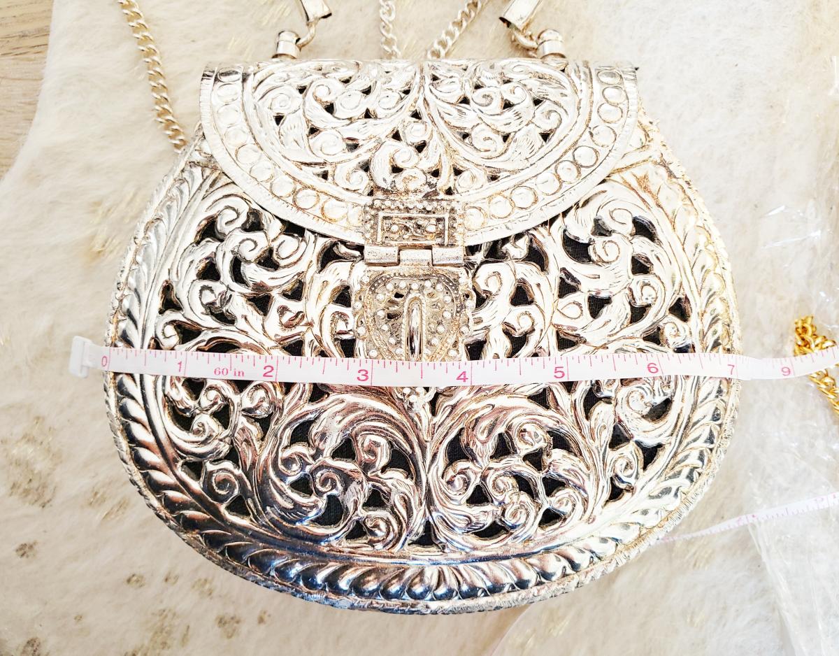 Hand Carved Brass Clutch picture