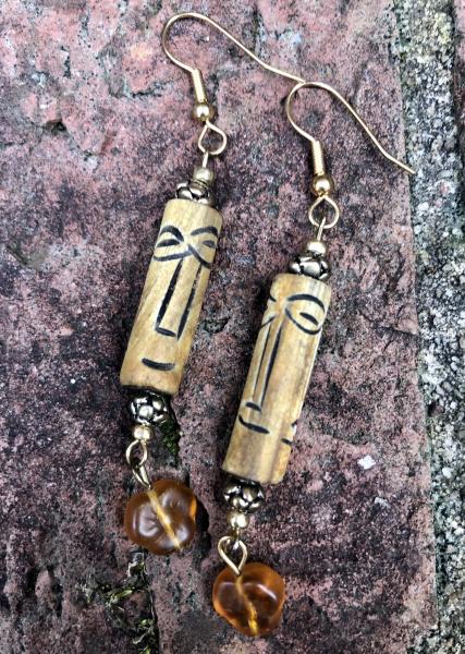 Wooden face earrings picture