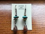 Earring of turquoise, jasper, and bronze
