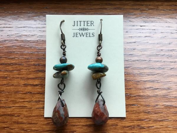 Earring of turquoise, jasper, and bronze