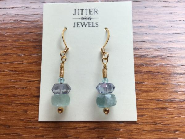 Earring of Tanzanite, Aquamarine, and gold