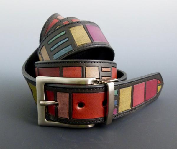 Hand carved and dyed reversible belt picture