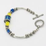 Blue and Yellow Bracelet by DianaHDesigns. Handmade Artisan Beaded Cane Glass, Silver Plated Beads & Toggle Clasp. Layer or wear alone!!