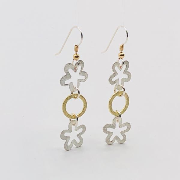 Interconnecting flower and circle dangle earrings in silver/gold, sterling silver ear wires. Elegant, sexy & lightweight. By DianaHDesigns picture