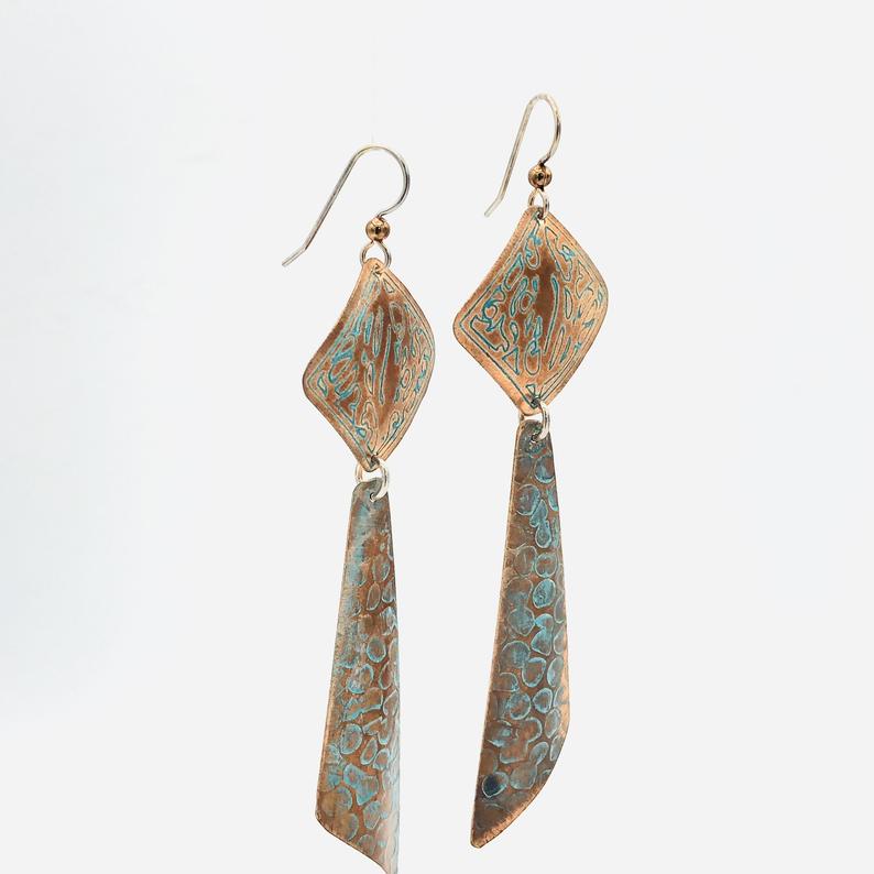 Long modern geometric copper pierced dangle earrings w/ boho flair! Handmade by DianaHDesigns! Etched, textured design, aged green patina. picture