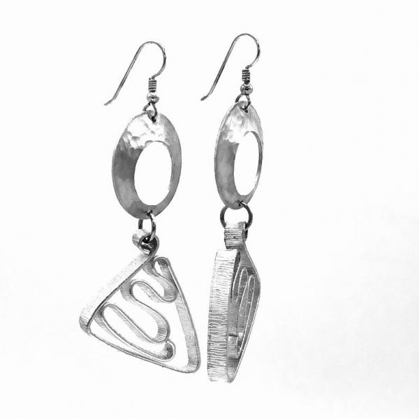 Cosmic geometric fun! Silver aluminum statement earrings by DianaHDesigns. Handmade, contemporary, geometric and lightweight! Only pair! picture