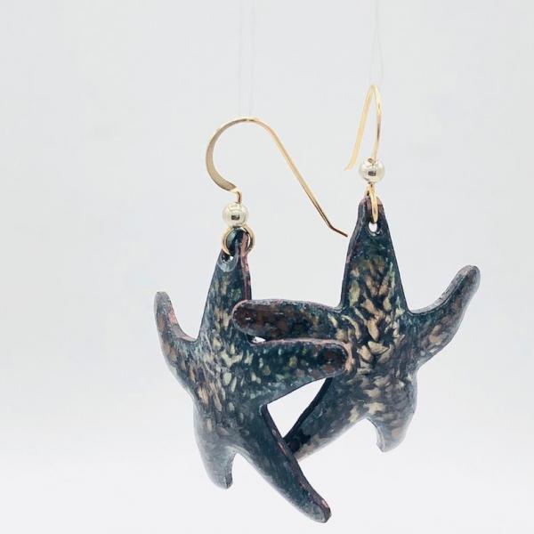 Handmade star shaped dangle earrings. Holiday style starfish in black/gold enamel. Beachy, tropical, fun! Artful Jewelry by DianaHDesigns