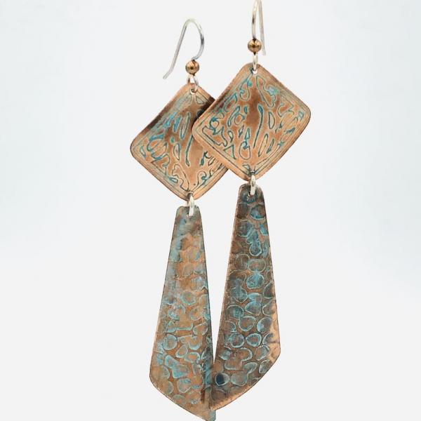 Long modern geometric copper pierced dangle earrings w/ boho flair! Handmade by DianaHDesigns! Etched, textured design, aged green patina. picture