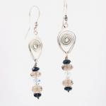 Modern design, boho appeal! Handmade Sterling Silver Dangle Earrings by DianaHDesigns. Crystals with Hand formed ear wires & wire detail!