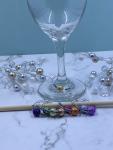 Set of nine wine charms
