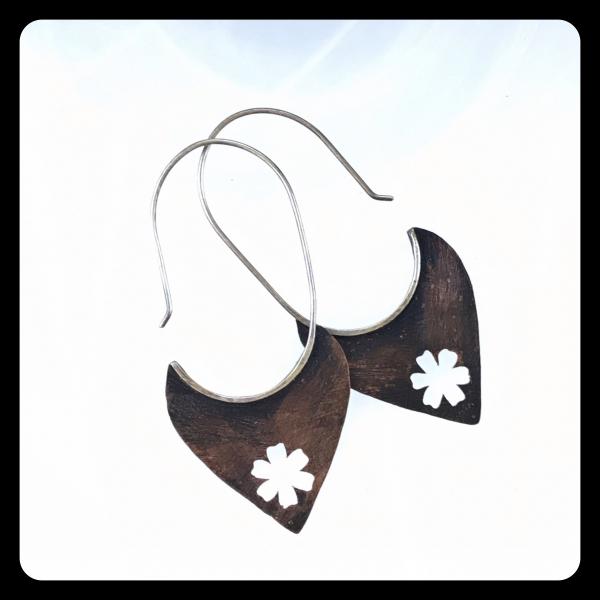 Copper Tooth Earring with Flower Silhouette cut out picture