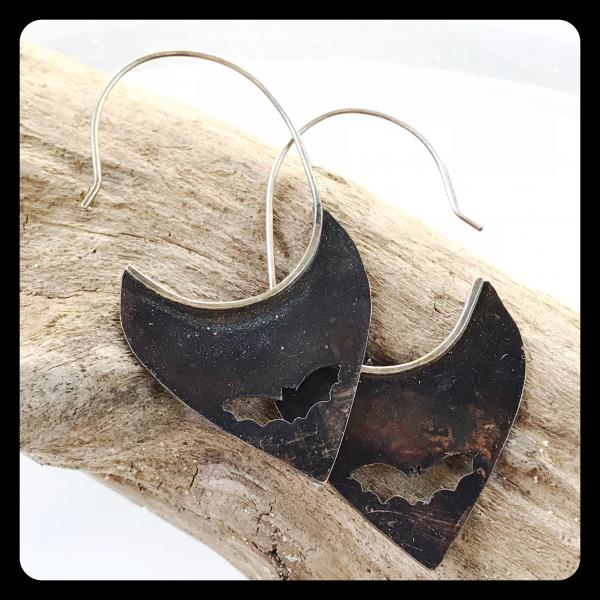 Copper Tooth Earring with Bat Silhouette cut out picture