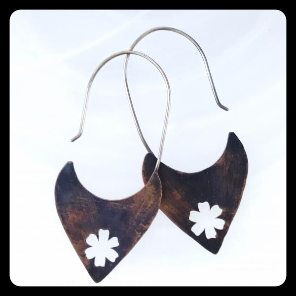 Copper Tooth Earring with Flower Silhouette cut out picture