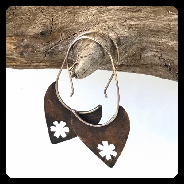Copper Tooth Earring with Flower Silhouette cut out picture