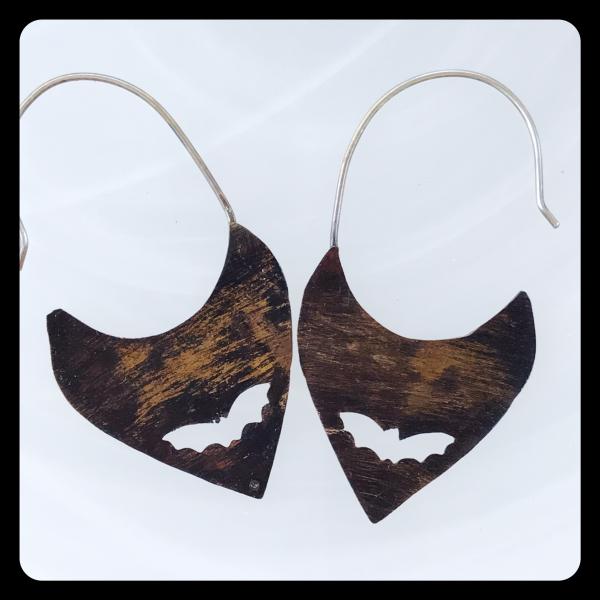 Copper Tooth Earring with Bat Silhouette cut out picture