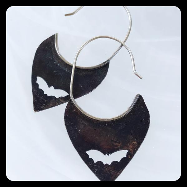 Copper Tooth Earring with Bat Silhouette cut out picture