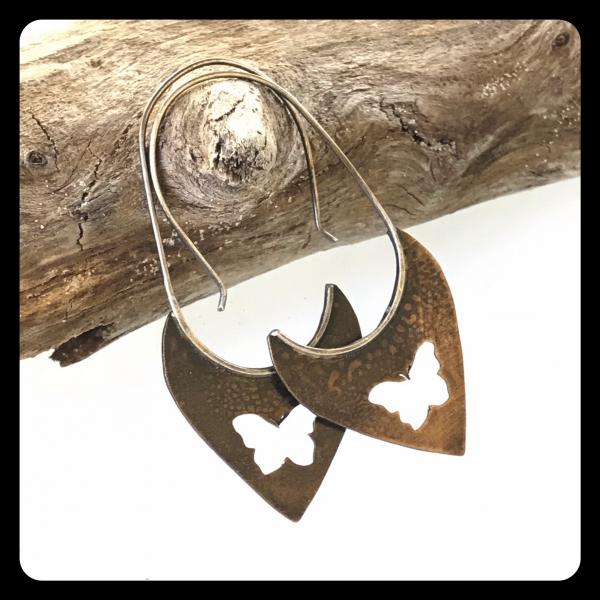 Copper Tooth Earring with Butterfly Silhouette cut out picture