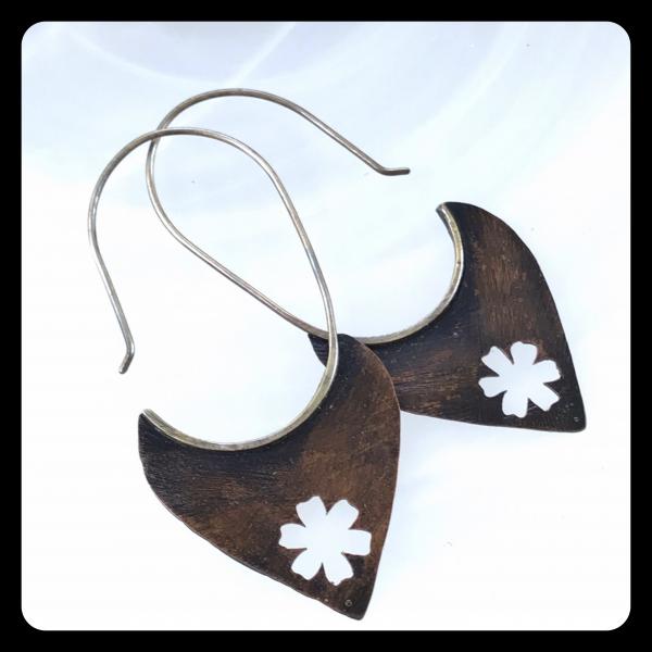 Copper Tooth Earring with Flower Silhouette cut out picture