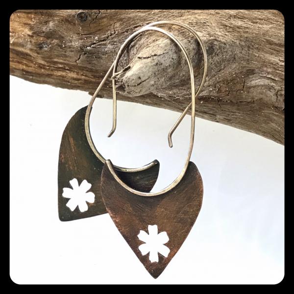 Copper Tooth Earring with Flower Silhouette cut out picture