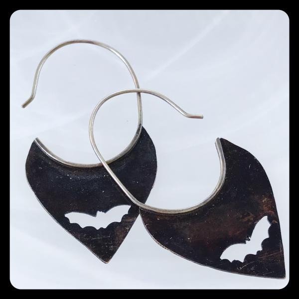 Copper Tooth Earring with Bat Silhouette cut out picture