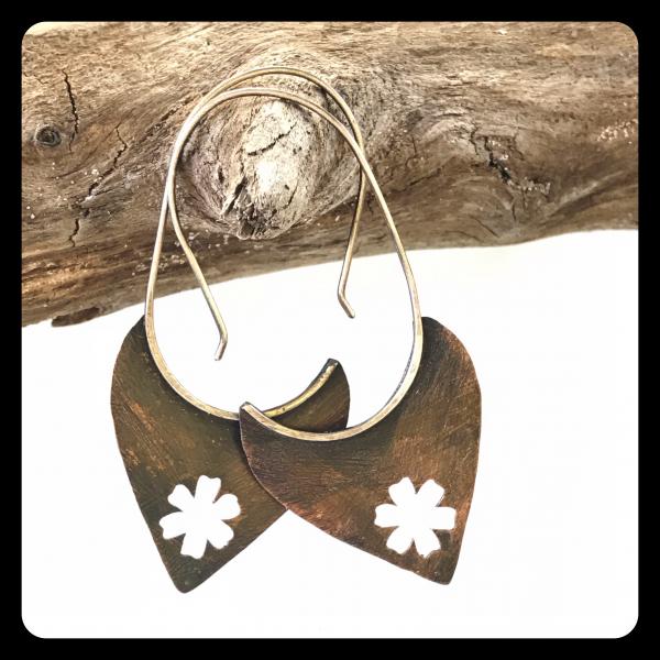 Copper Tooth Earring with Flower Silhouette cut out picture