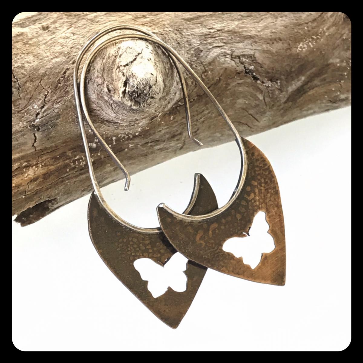 Copper Tooth Earring with Butterfly Silhouette cut out picture