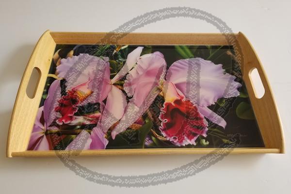 Orchids on a wood tray