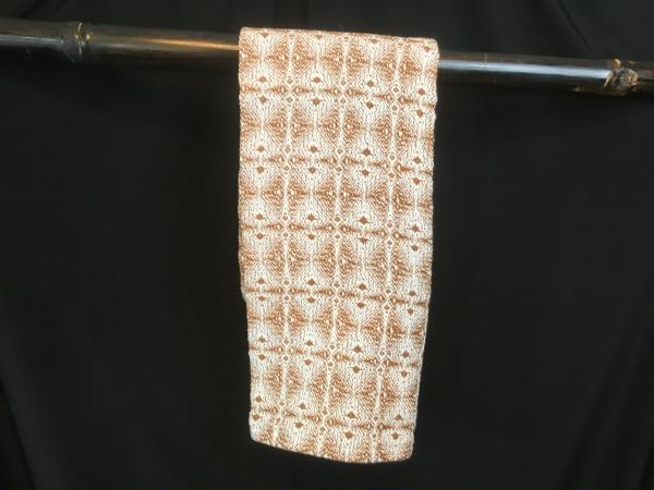Handwoven tea towel in snowflake pattern picture