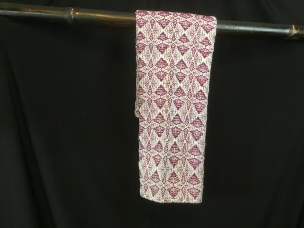 Handwoven tea towel in snowflake pattern picture