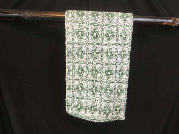 Handwoven tea towel in snowflake pattern