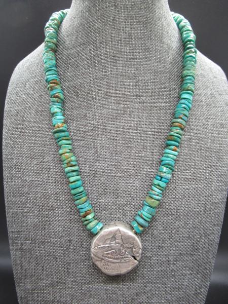 Beaded Necklace with Textured Silver Pendant picture