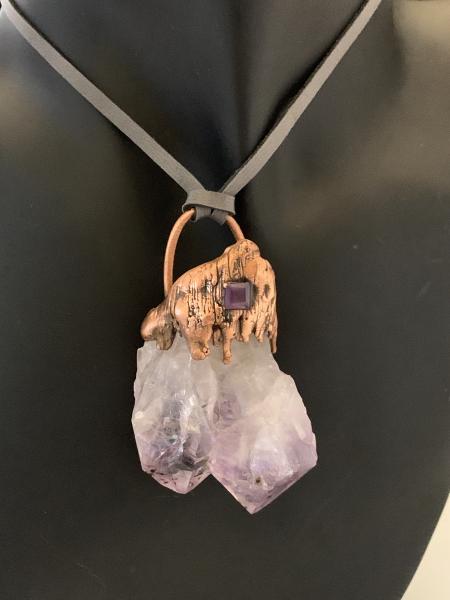 Double amethyst point on leather picture