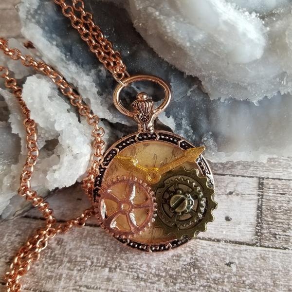 Steampunk Copper, Gold, & Antique Bronze Gears in Resin in Vintage Watch Shaped Pendant picture