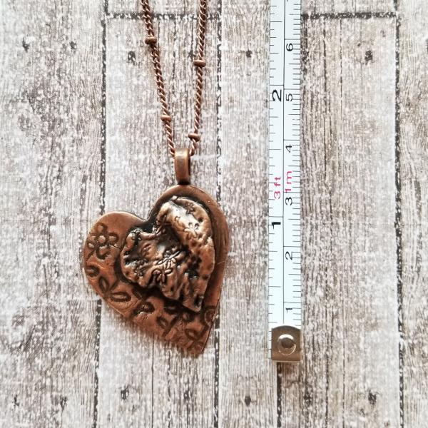 Solid Copper Flower Heart on Heart Necklace picture