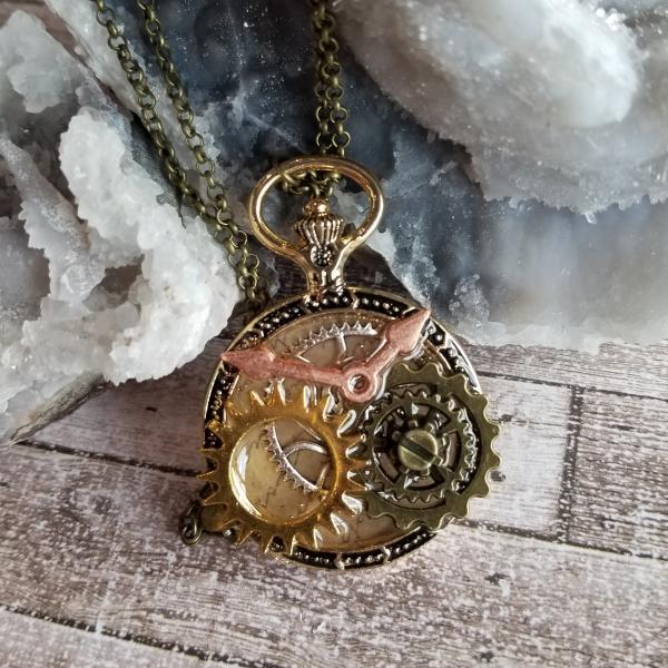 Steampunk Gold, Copper, Silver & Antique Bronze Gears in Resin in Vintage Watch Shaped Pendant picture