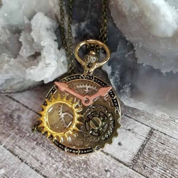 Steampunk Gold, Copper, Silver & Antique Bronze Gears in Resin in Vintage Watch Shaped Pendant picture