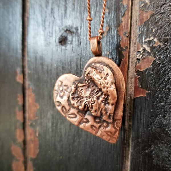 Solid Copper Flower Heart on Heart Necklace picture