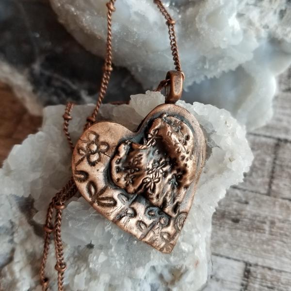 Solid Copper Flower Heart on Heart Necklace picture