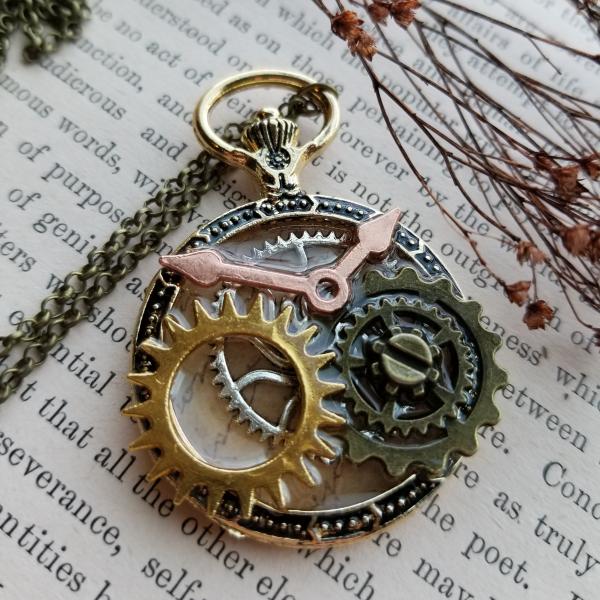 Steampunk Gold, Copper, Silver & Antique Bronze Gears in Resin in Vintage Watch Shaped Pendant picture