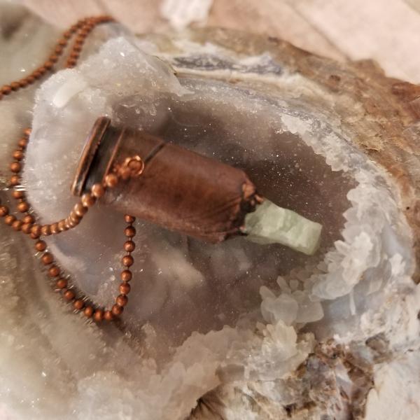 Shell Casing with Raw Fluorite and Electroformed Copper picture