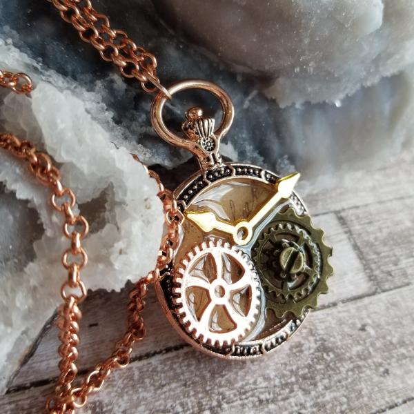 Steampunk Copper, Gold, & Antique Bronze Gears in Resin in Vintage Watch Shaped Pendant picture