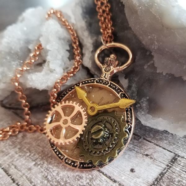 Steampunk Copper, Gold, & Antique Bronze Gears in Resin in Vintage Watch Shaped Pendant picture