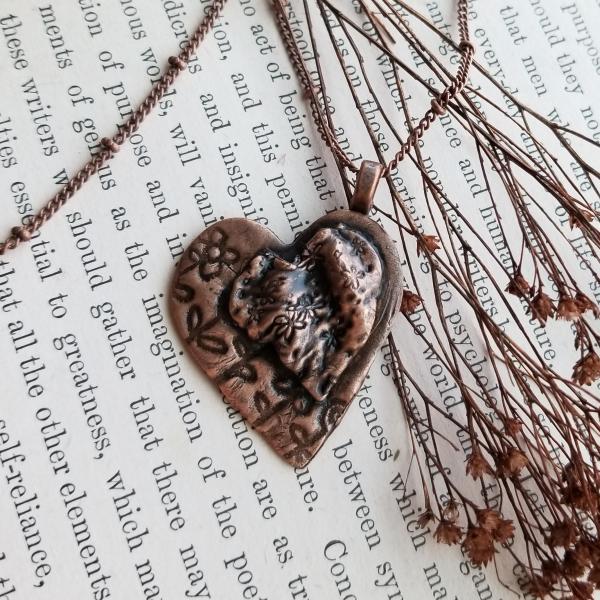 Solid Copper Flower Heart on Heart Necklace picture