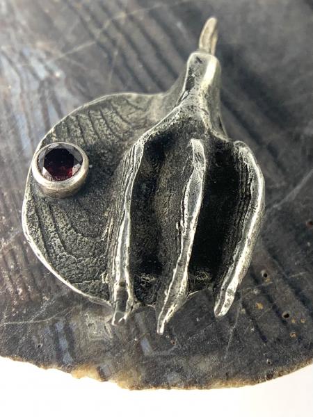 Cast bird claw pendant